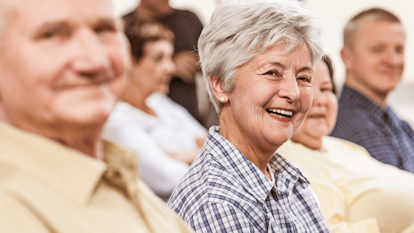 Older adults at a community meeting