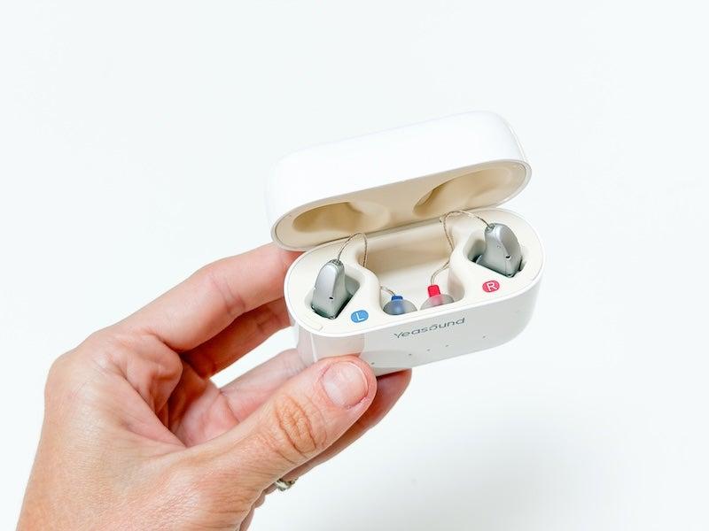 The Yeasound RIC800 hearing aids in their charging case