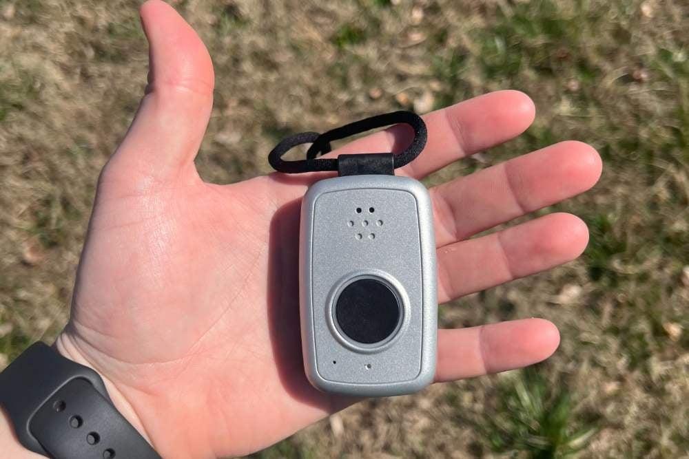 MobileHelp Solo in the palm of a person’s hand