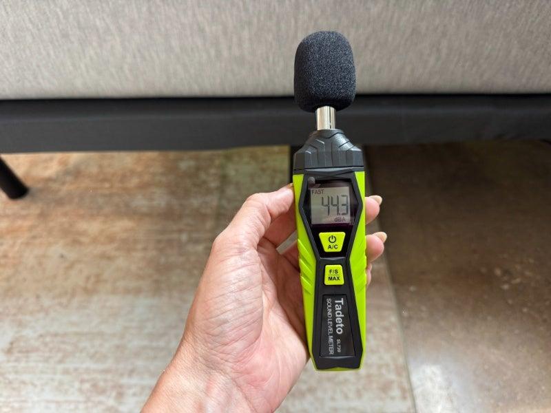A sound meter measuring 44.3 decibels in front of the Nectar Adjustable Bed Frame