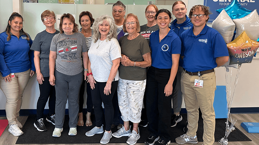 Smiling multi-generational falls prevention clinic organizers