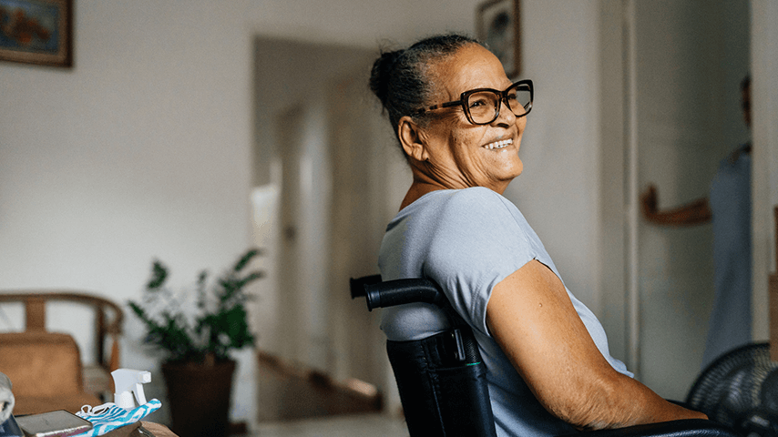 Smiling older woman in wheelchair