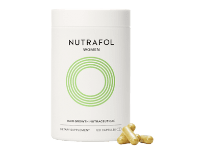 A bottle of Nutrafol Women supplements