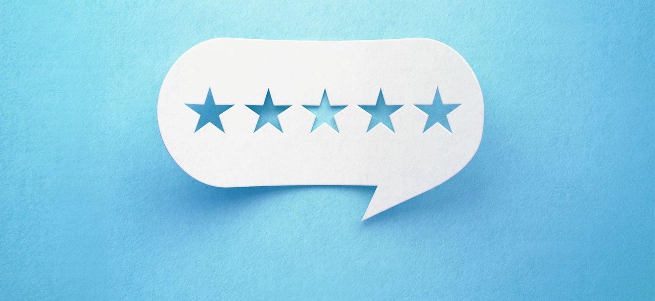 A quote bubble on a blue background with five stars in it, indicating a review.