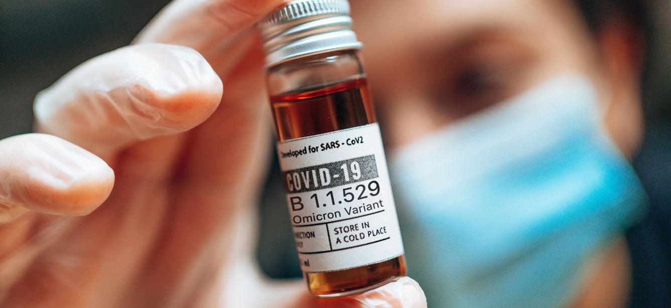 A close up shot of a vial of the Omicron variant that's ready to be tested.
