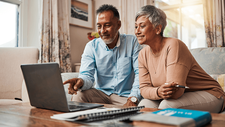 older couple looking at laptop screen