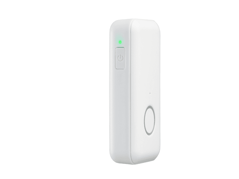 The LifeStation Pearl medical alert system in white with a green light shining on its side