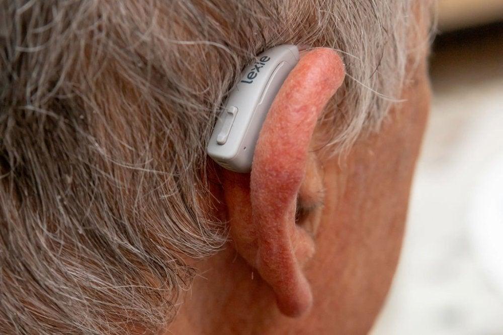 Lexie hearing aid on man's right ear