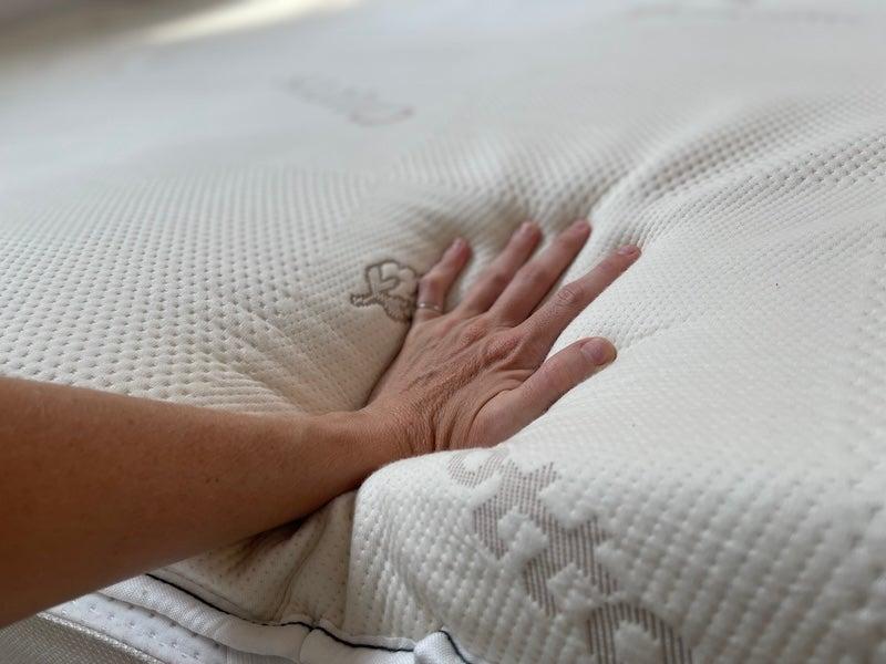 The Saatva Graphite Memory Foam mattress topper